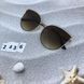 Модні сонцезахисні окуляри коричневі